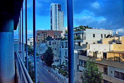 High angle view of buildings and street in city
