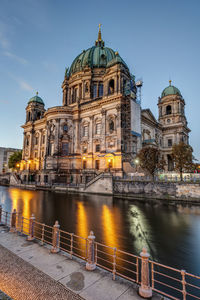 Illuminated buildings in city at night