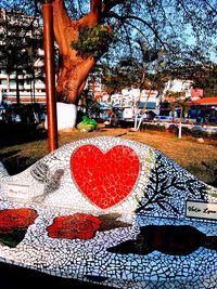 Heart shape on table in park