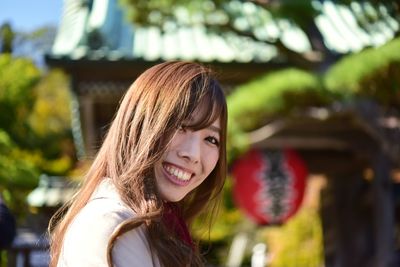 Portrait of a smiling young woman