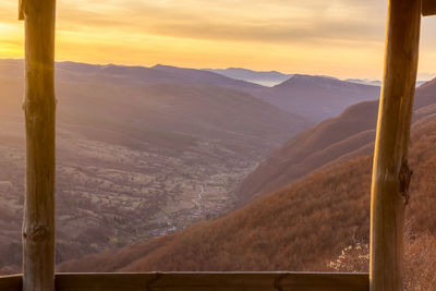 Scenic view of mountains against sky during sunset