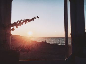 Scenic view of sea at sunset