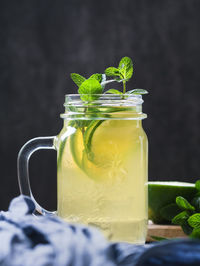 Close-up of mojito in jar on table