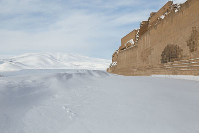 Scenic view of snow mountains against sky