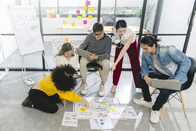 High angle view of people on table