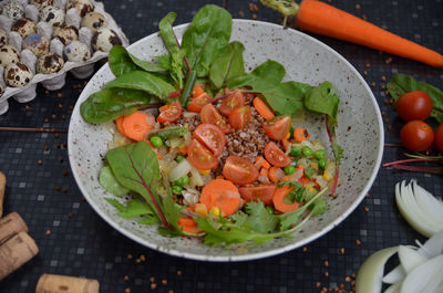 High angle view of vegetables in bowl on table