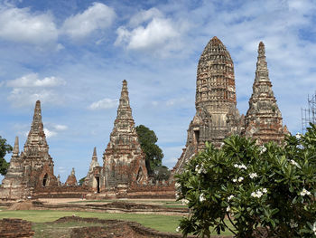 View of temple against building