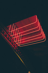 High angle view of illuminated light against black background