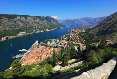 High angle view of town by river