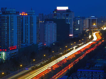 High angle view of illuminated buildings at night