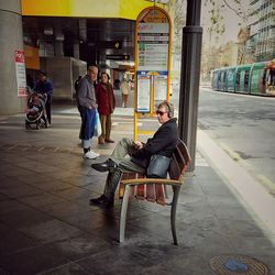 Woman sitting in bus