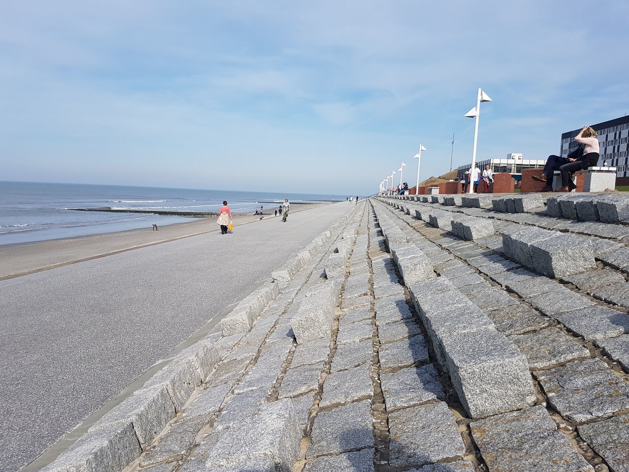 sea, beach, real people, horizon over water, outdoors, sky, water, men, day, nature, sand, women, large group of people, bird, architecture, people