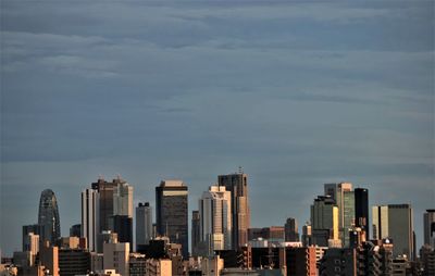 Modern cityscape against sky