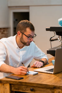 Man working on table