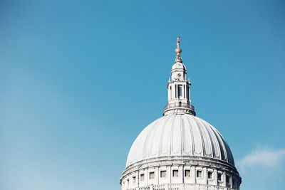 Low angle view of st paul cathedral against blue sky