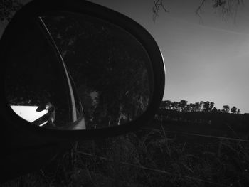 Close-up of car on road