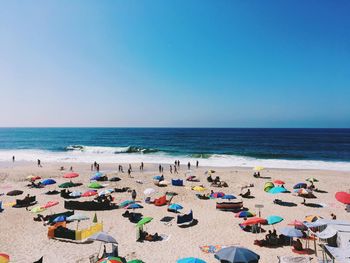 Scenic view of beach against clear sky