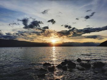 Scenic view of sea against sky during sunset