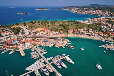 Aerial view of harbor in touristic city and moored yachts. marina frapa in rogoznica