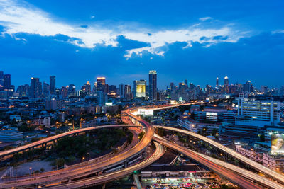 High angle view of illuminated cityscape at night