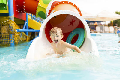 Man swimming in water