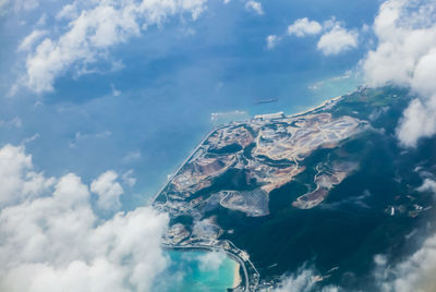 Low angle view of clouds over sea against sky