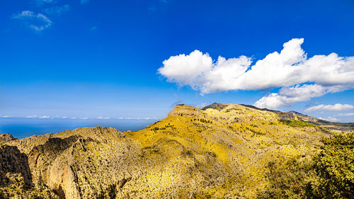 Low angle view of rocks against sky