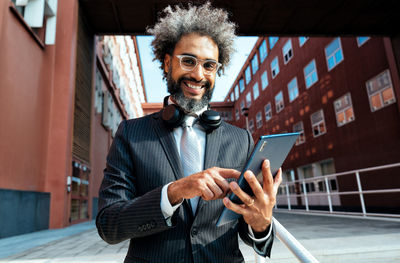 Portrait of man using mobile phone