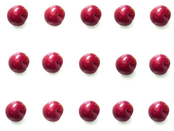 Close-up of tomatoes against white background