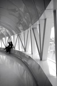 Full length of woman standing in modern building