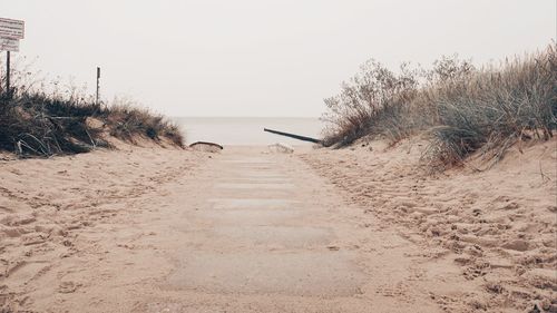 Scenic view of beach against clear sky