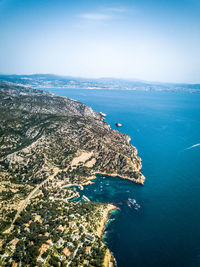 High angle view of bay against sky