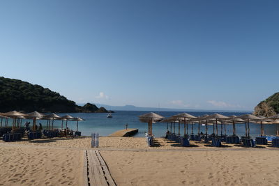 Scenic view of beach against clear sky