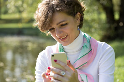 Young woman using mobile phone