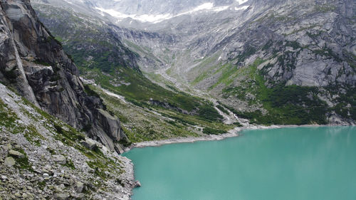 High angle view of river amidst mountains