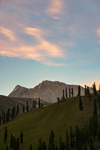 Scenic view of mountains against sky during sunset