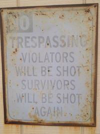 Close-up of text on wall