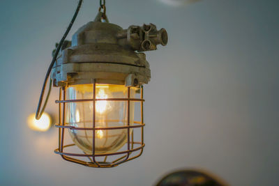 Low angle view of illuminated light bulb