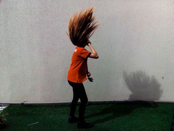 Full length of boy standing on floor