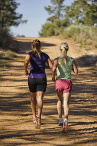 Two women running