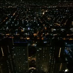 View of illuminated cityscape at night