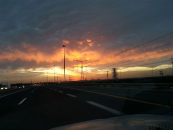 Empty road at sunset