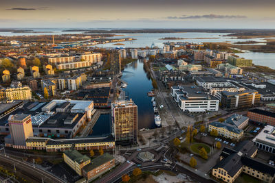 High angle view of river amidst buildings in city