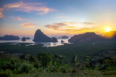 Scenic view of landscape against sky during sunset