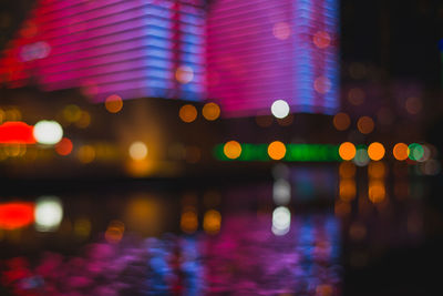Night bokeh light in big city, abstract blur defocused background.