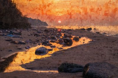 Scenic view of volcanic landscape during sunset