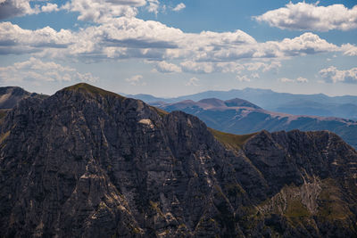 Scenic view of rocky mountains against sky in ussita, marche italy