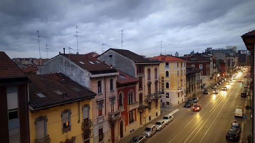 City street against cloudy sky