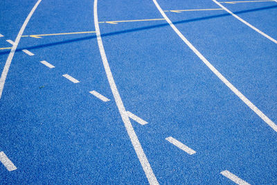 Full frame shot of blue sports track