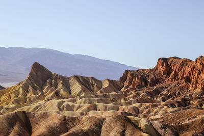 Scenic view of mountains against clear sky